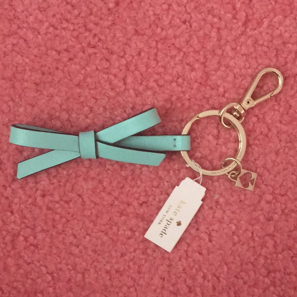 Kate Spade blue bow leather key chain.